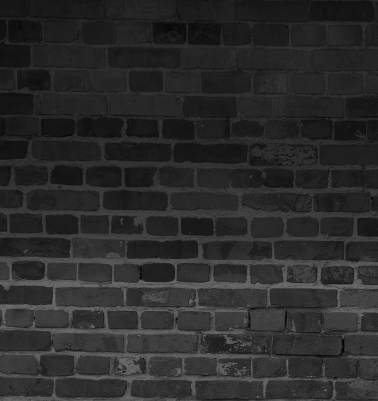 Black and white textured brick wall with an urban industrial look