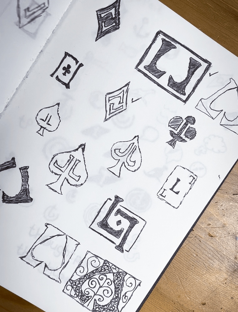 Exploratory logo design sketches for Isle of Wight magician Luke Lamont during the branding process